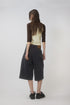 CIRCLE CUT-OUT WASHED HALF PANTS -BLACK DENIM-