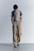 CIRCLE CUT-OUT PANTS -RUSTED BEIGE-